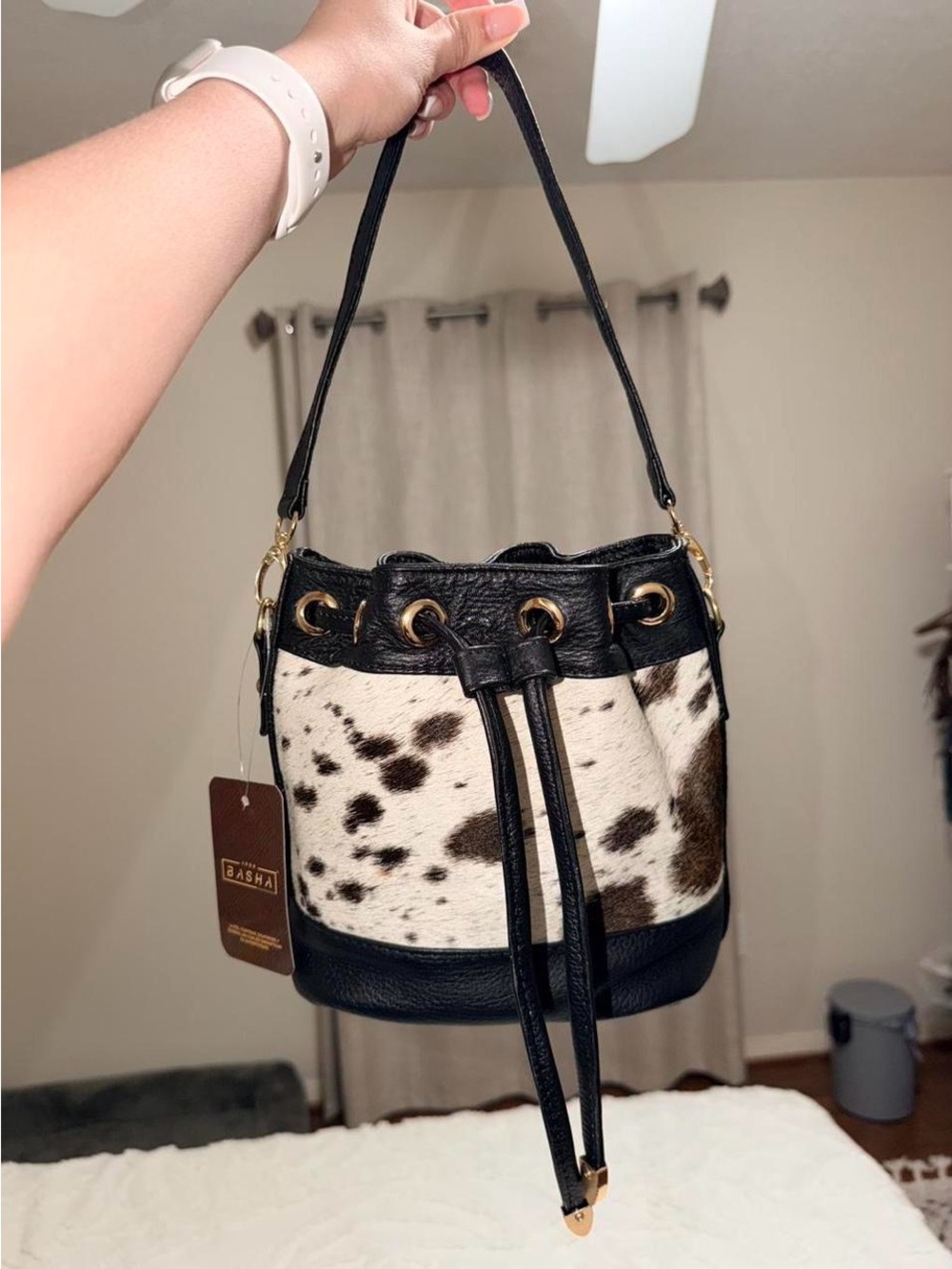 Cowhide Drawstring Bucket Bag with Black Trim